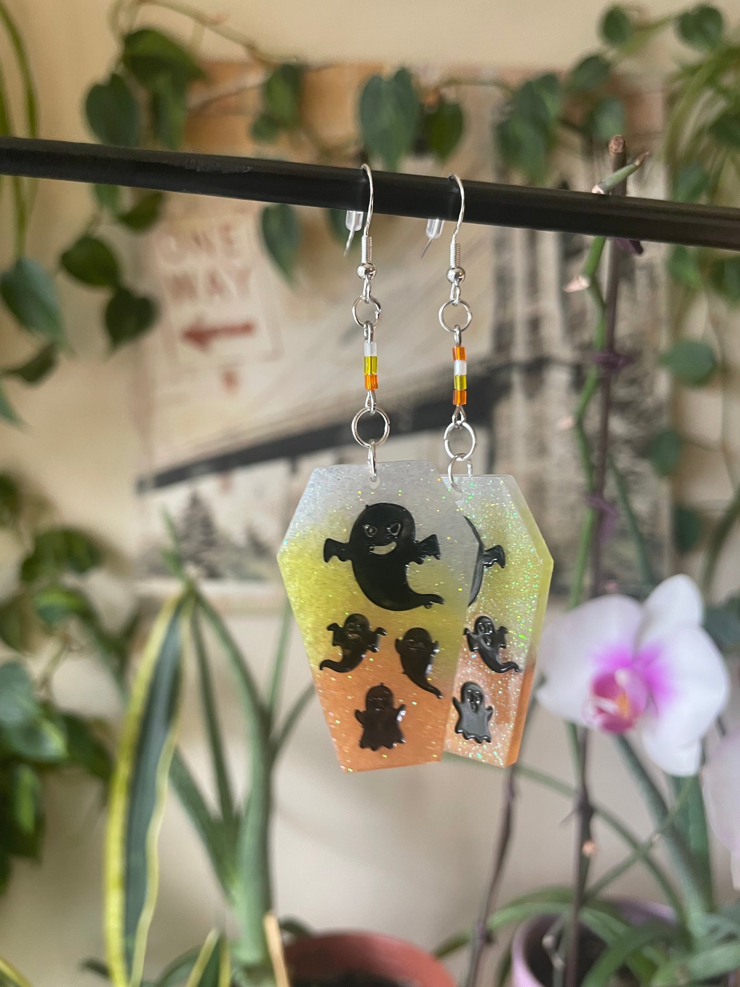 Spooky themed imprinted epoxy resin coffin earrings