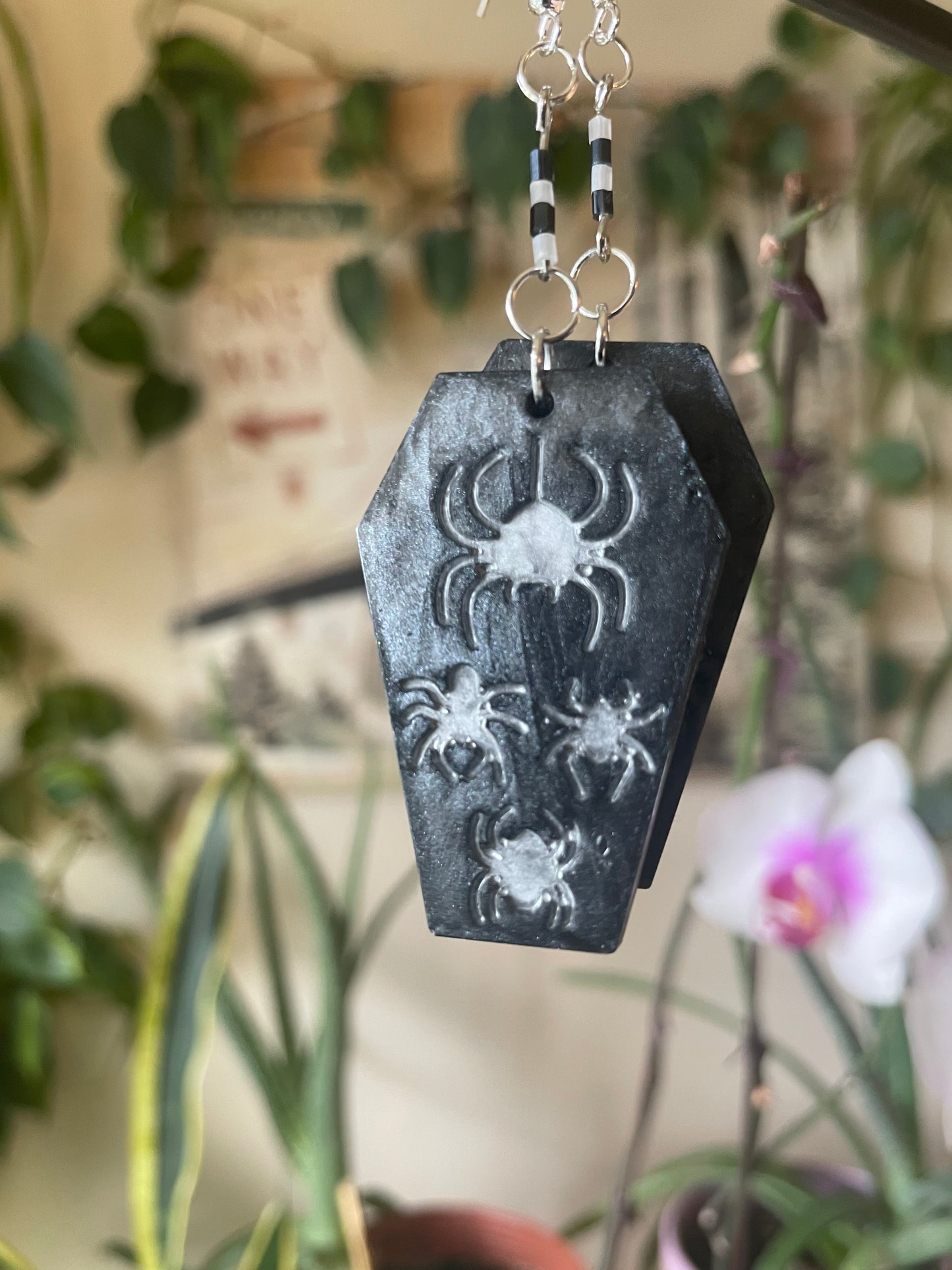 Spooky themed imprinted epoxy resin coffin earrings