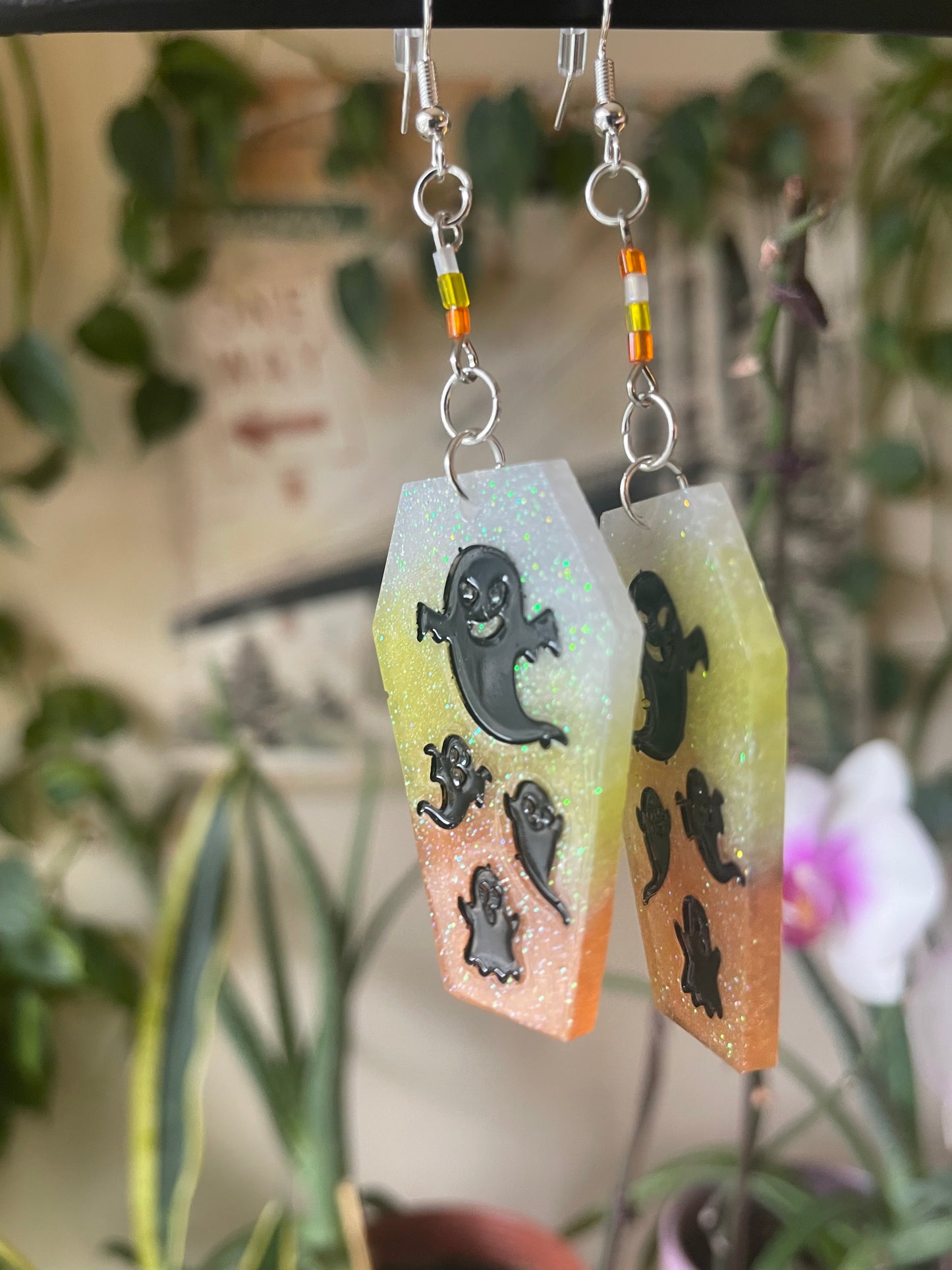 Spooky themed imprinted epoxy resin coffin earrings