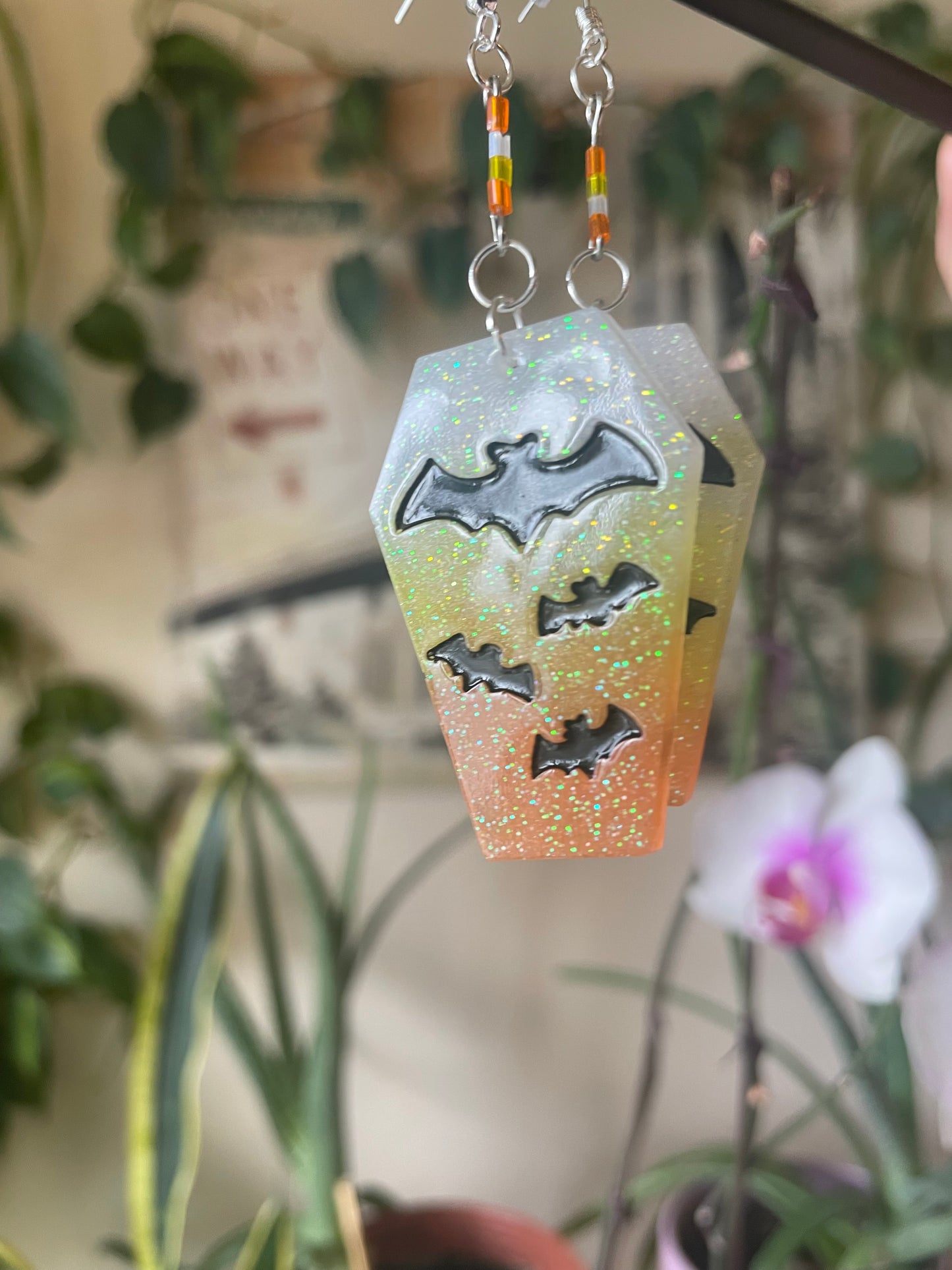 Spooky themed imprinted epoxy resin coffin earrings
