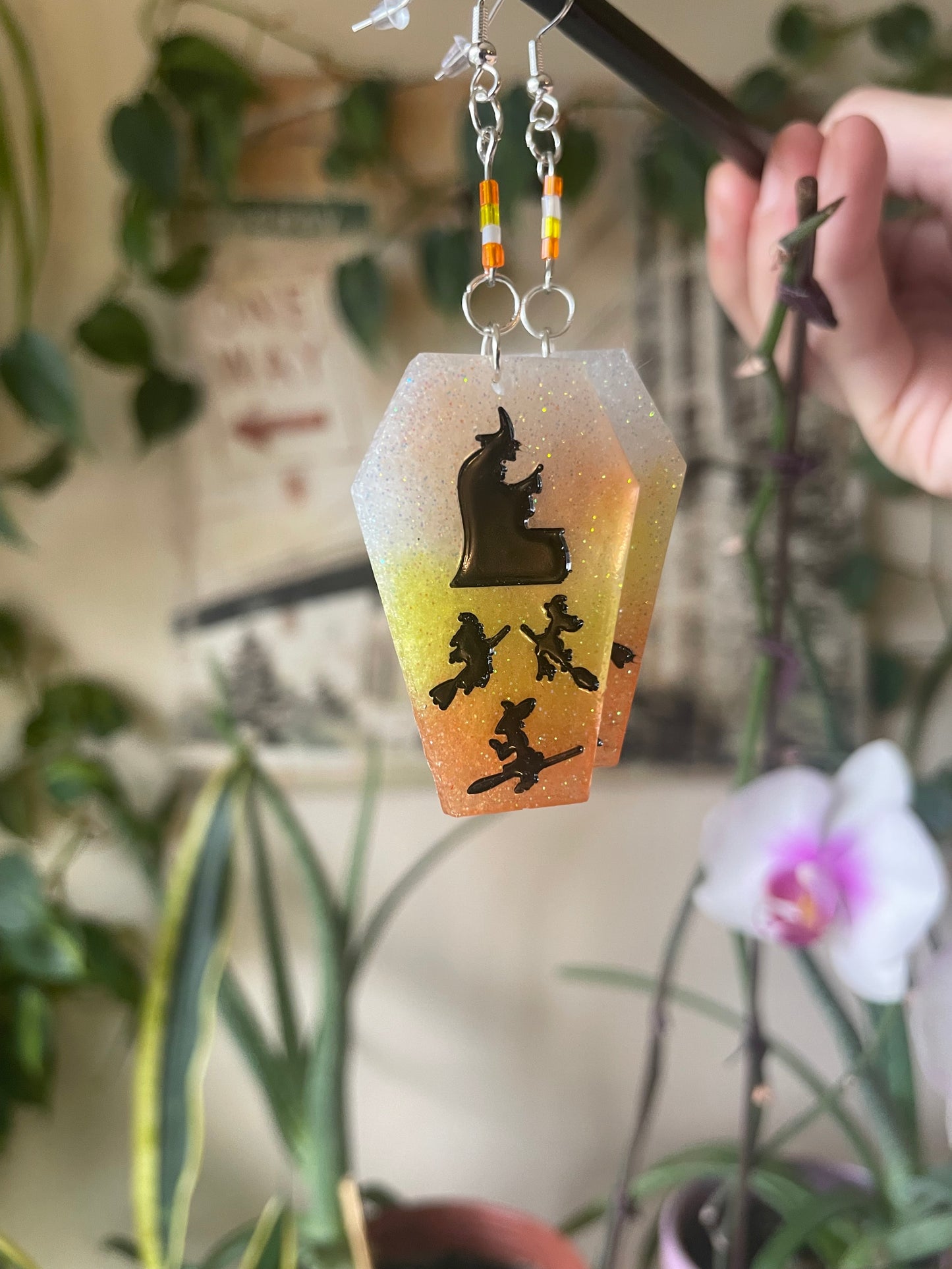Spooky themed imprinted epoxy resin coffin earrings