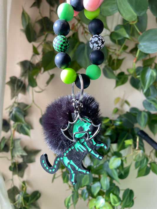 Black and green skelekitties