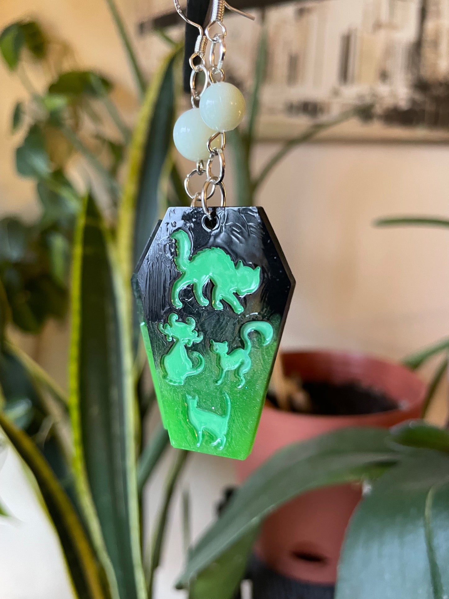 Spooky themed imprinted epoxy resin coffin earrings
