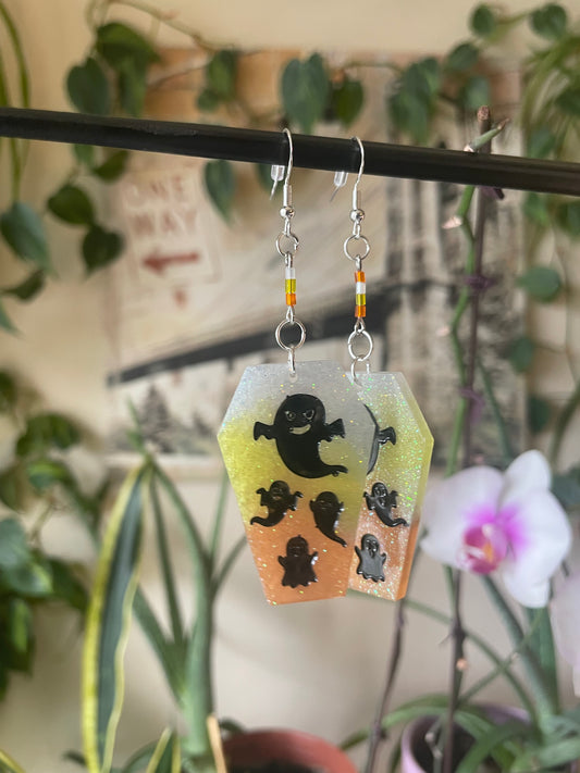 Spooky themed imprinted epoxy resin coffin earrings