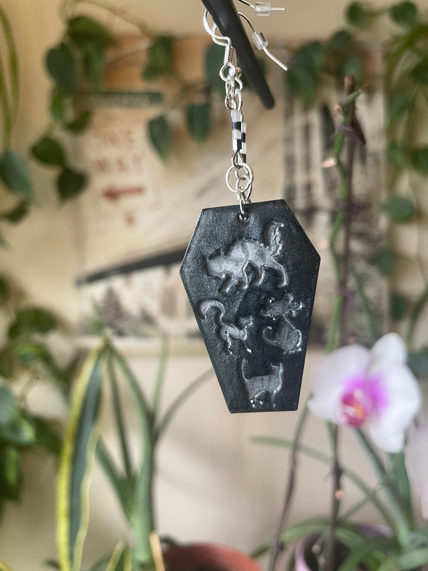 Spooky themed imprinted epoxy resin coffin earrings