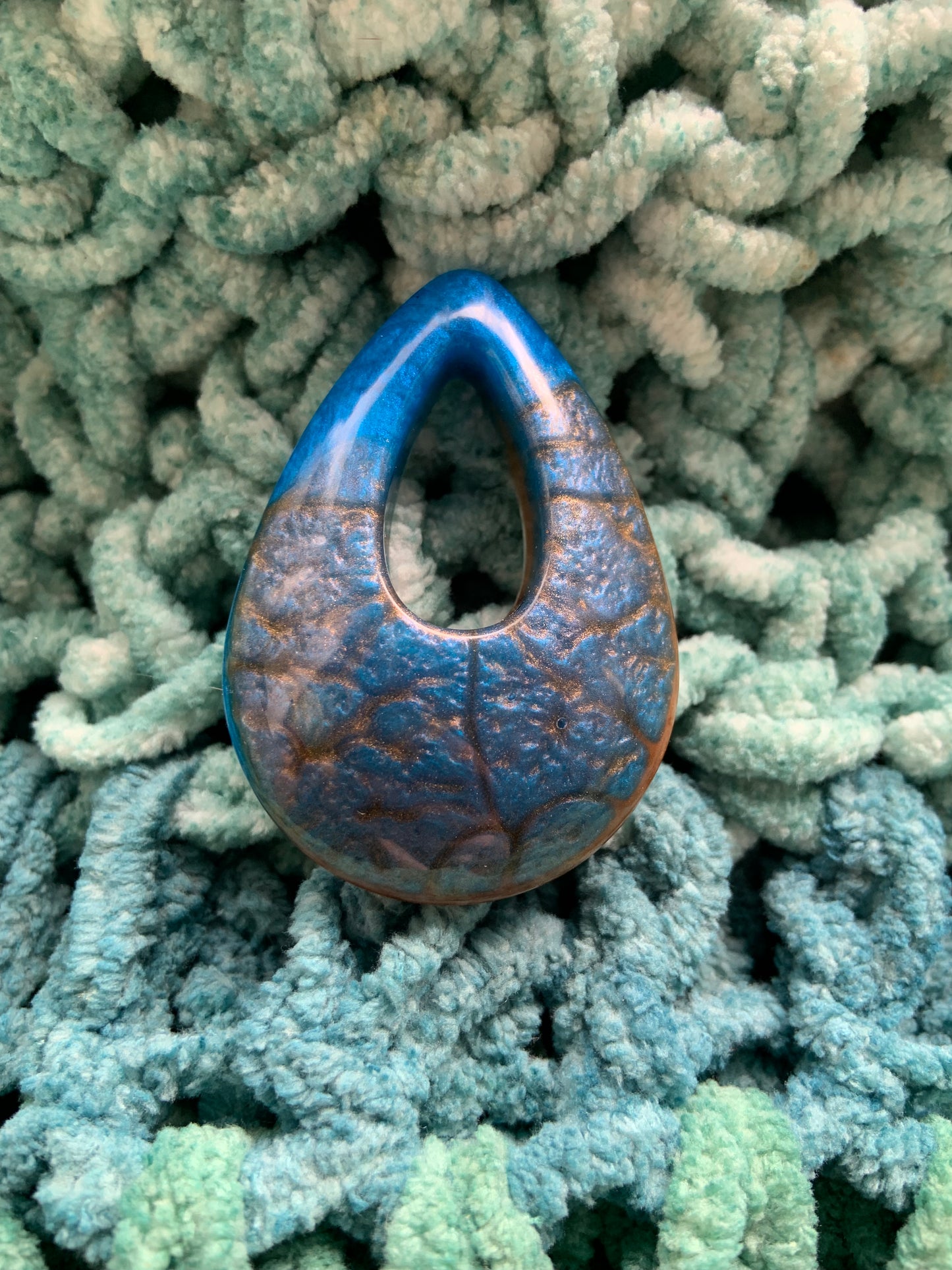 Orange iris epoxy resin amulet