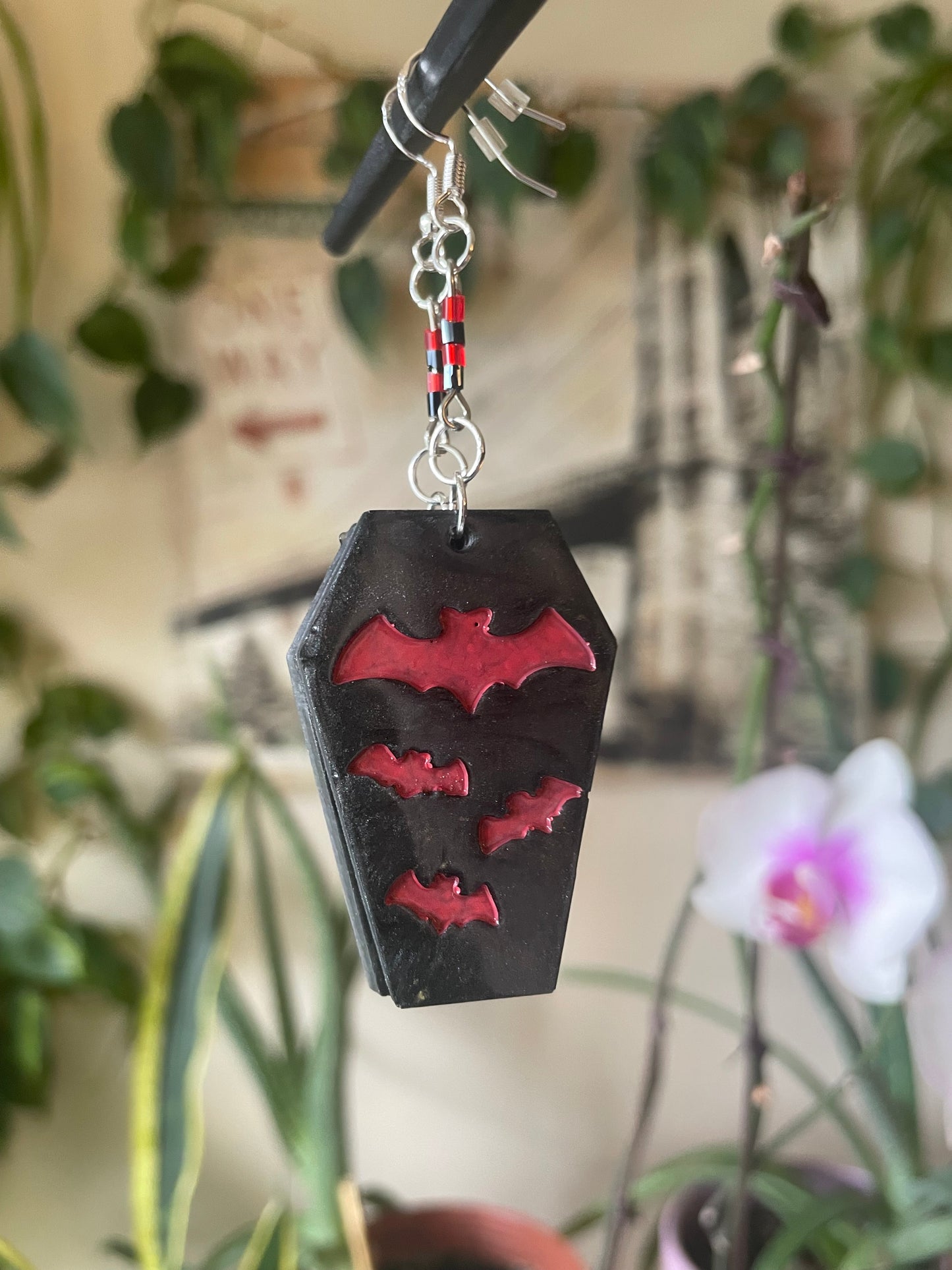 Spooky themed imprinted epoxy resin coffin earrings
