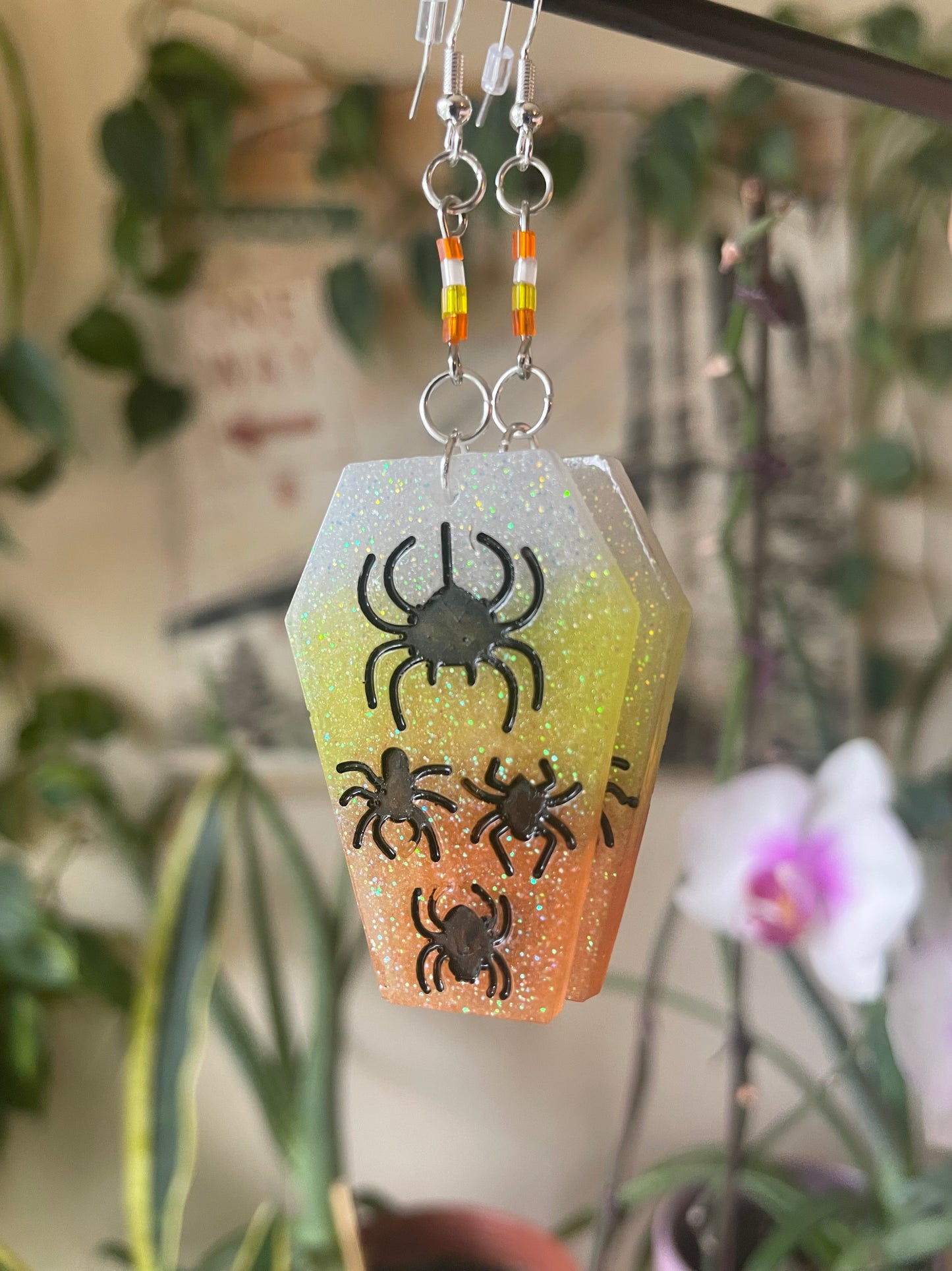 Spooky themed imprinted epoxy resin coffin earrings