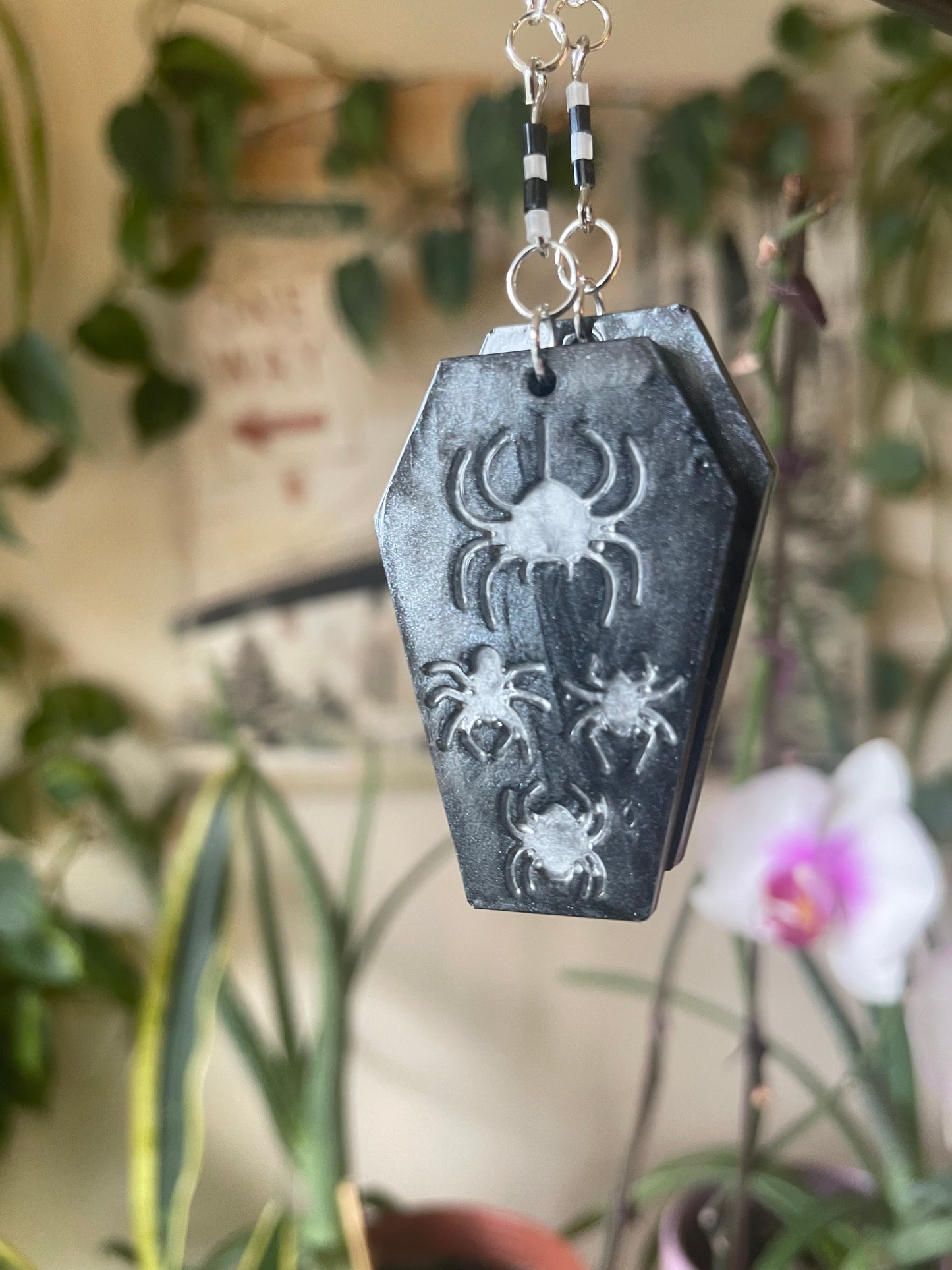 Spooky themed imprinted epoxy resin coffin earrings