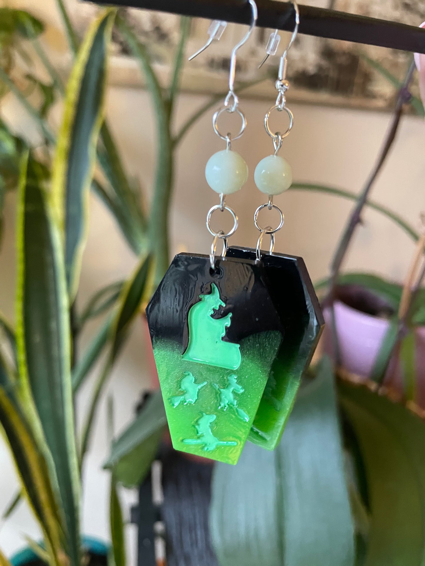 Spooky themed imprinted epoxy resin coffin earrings
