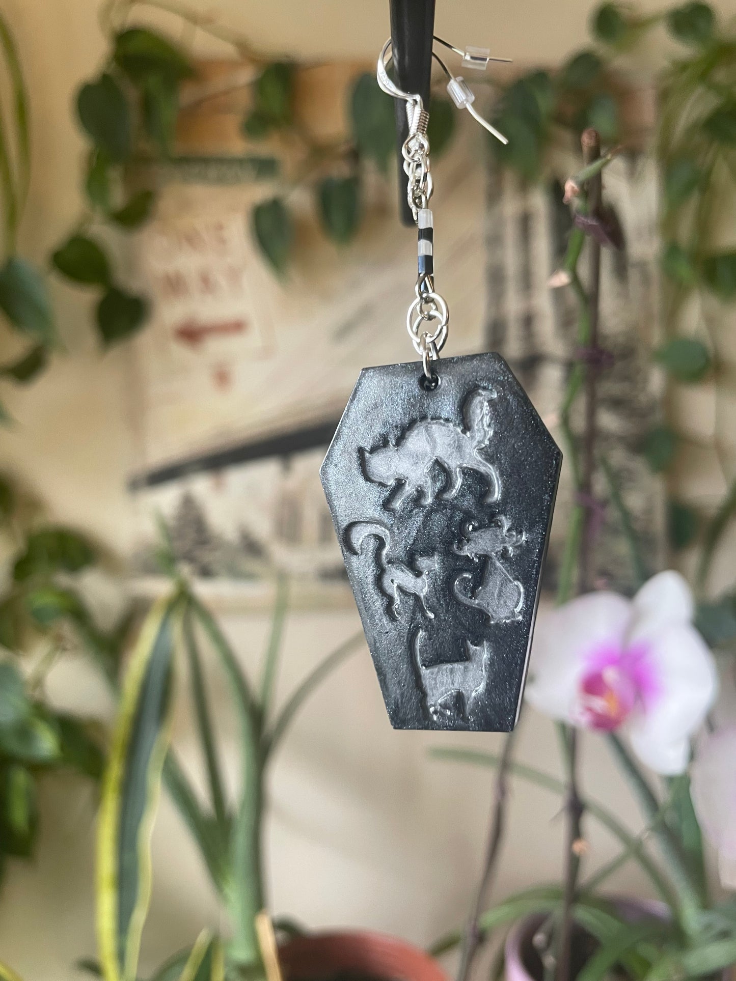 Spooky themed imprinted epoxy resin coffin earrings