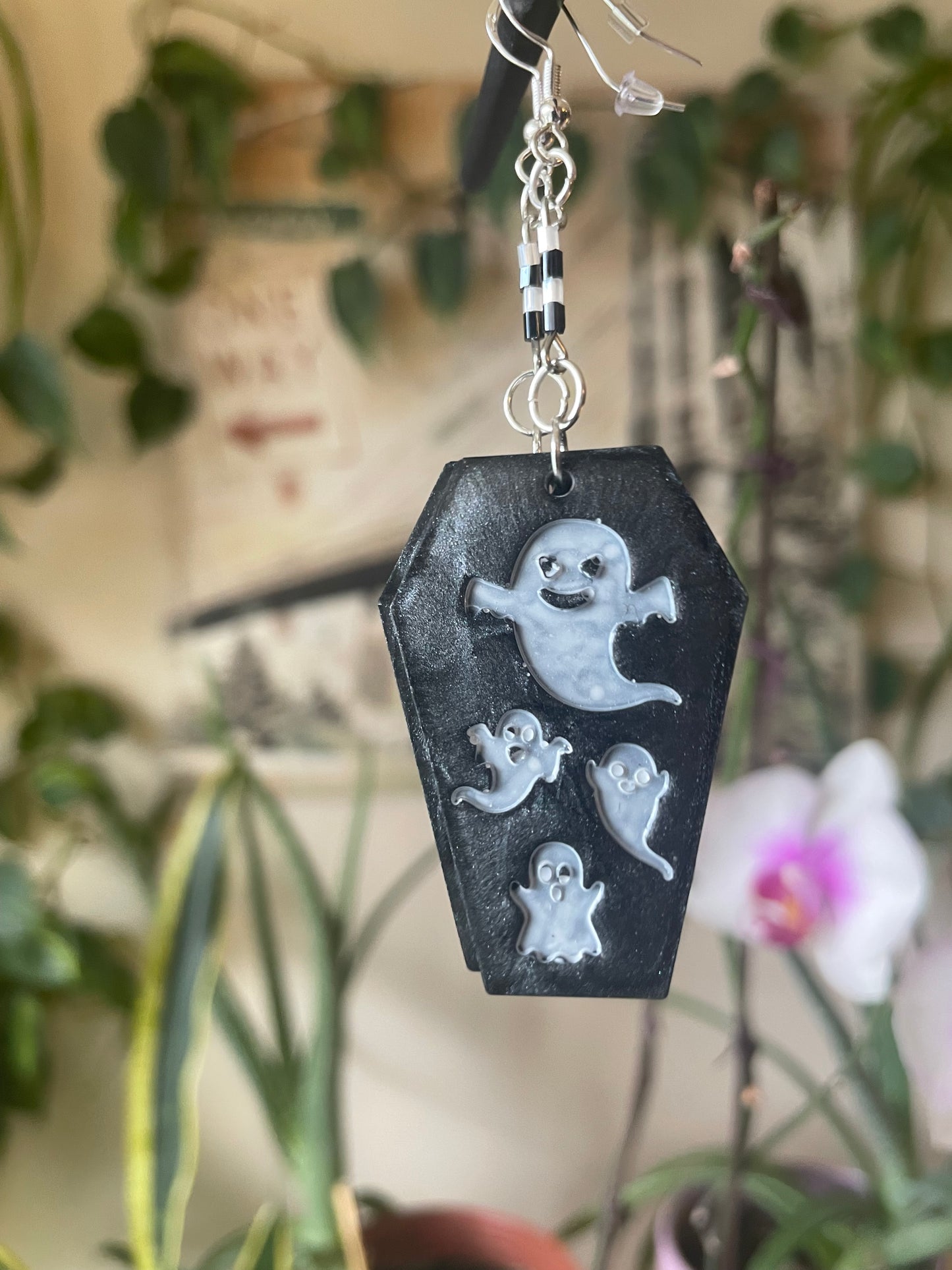 Spooky themed imprinted epoxy resin coffin earrings