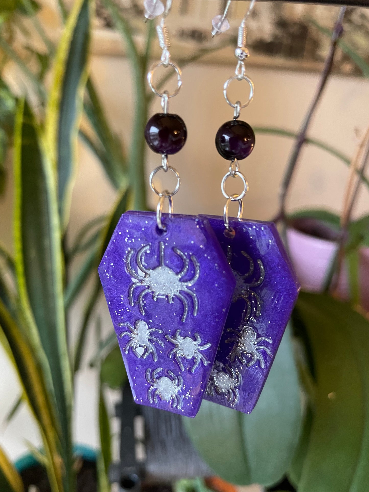 Spooky themed imprinted epoxy resin coffin earrings