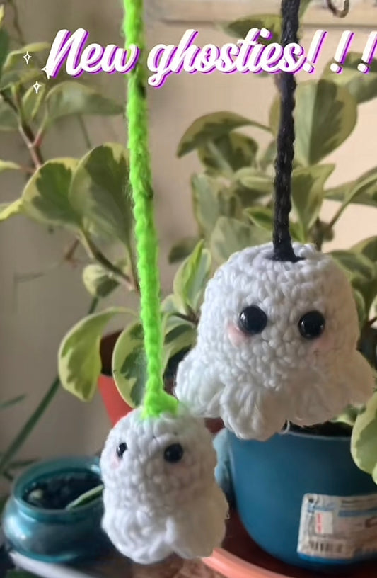 Two small ghosts on crochet hanger