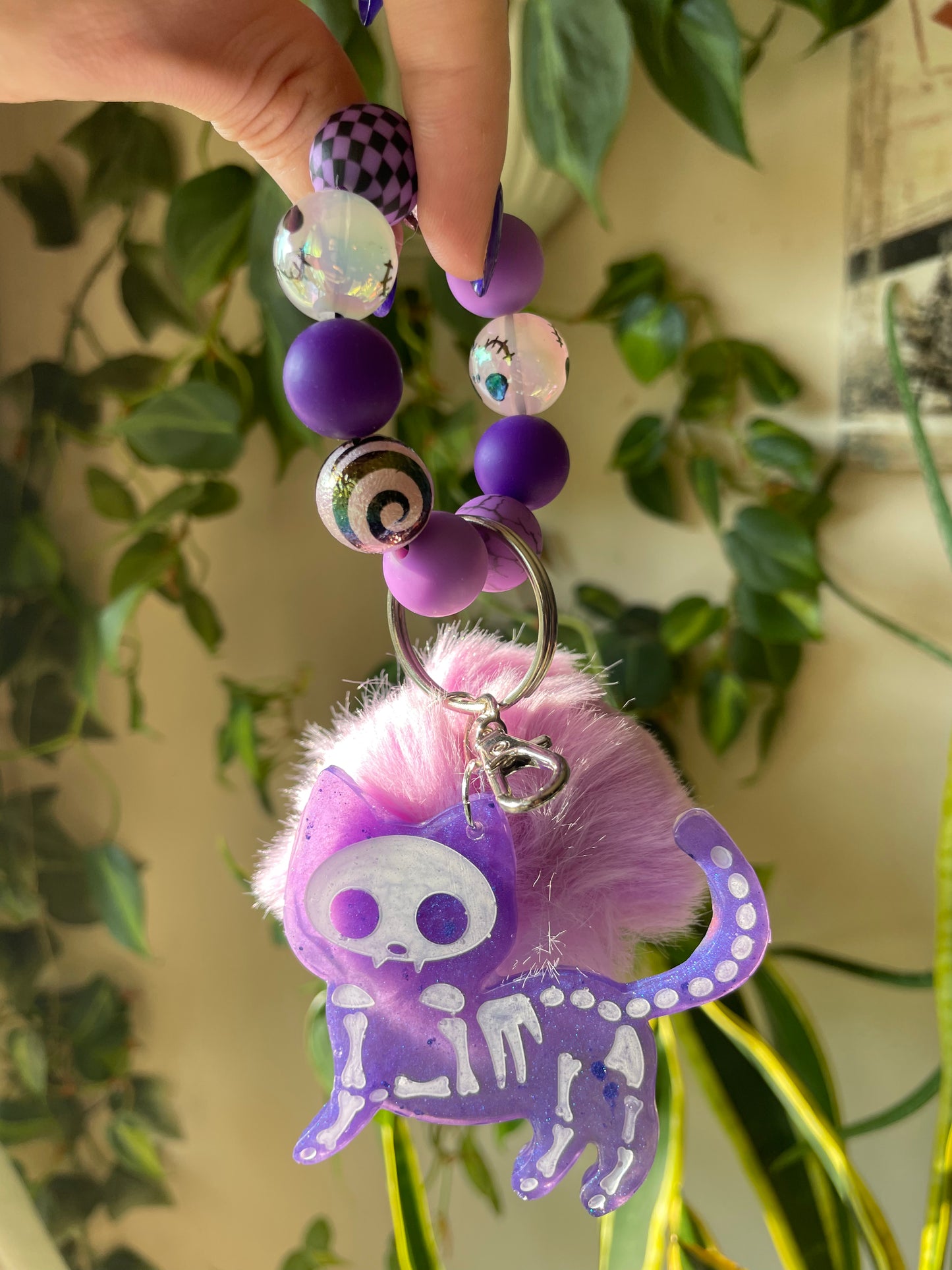 Purple skele-kitty bag charm and keychain