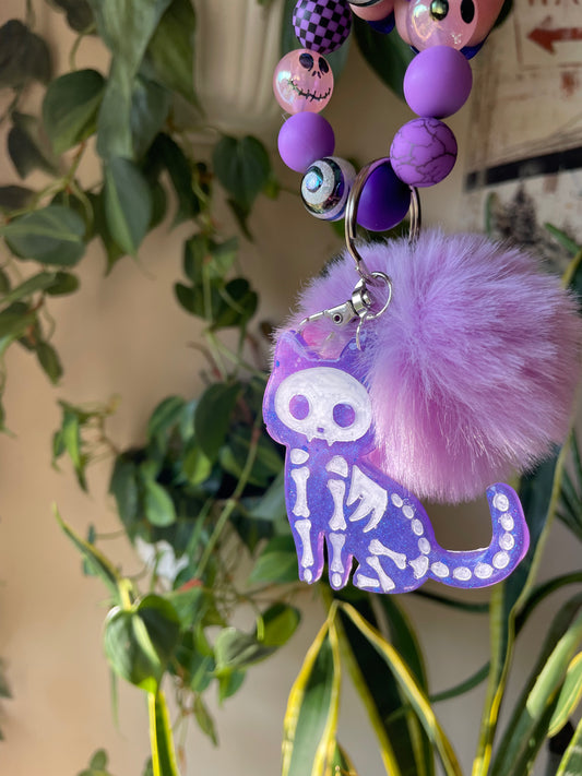 Purple skele-kitty bag charm and keychain