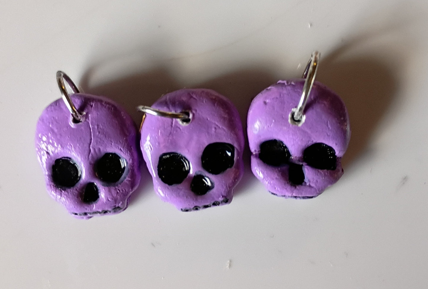 Skelly clay stitch markers